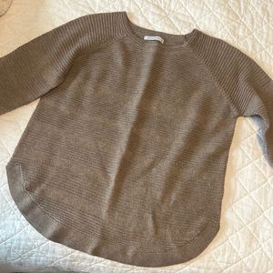 Tan sweater with scallop hem